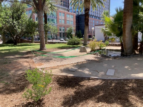 Work in progress on the pond by the UA Grounds Services Staff.