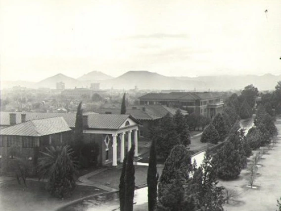 1935. Aerial shot of campus, along South Campus Drive. "A" Mountain is in the distance.