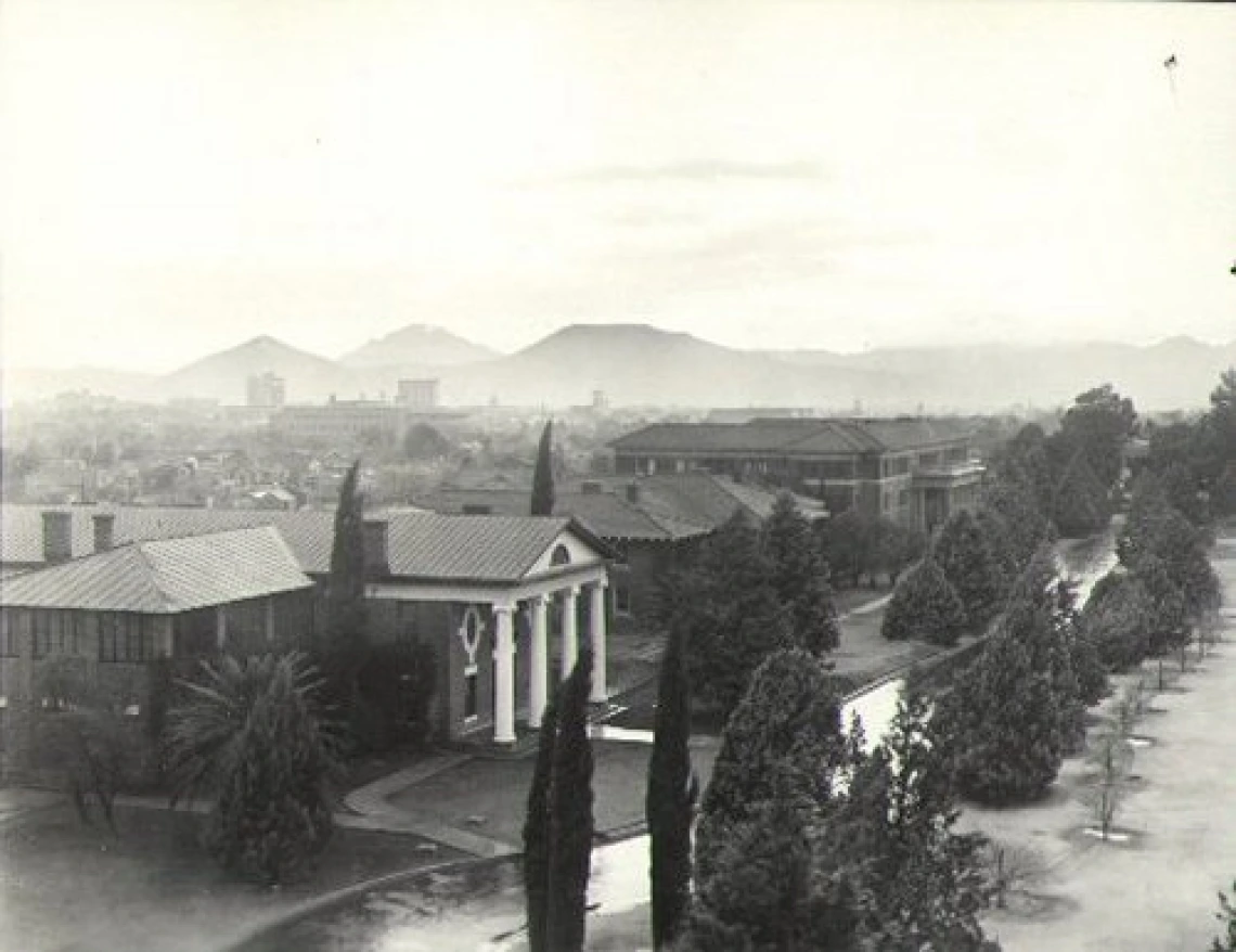 1935. Aerial shot of campus, along South Campus Drive. "A" Mountain is in the distance.